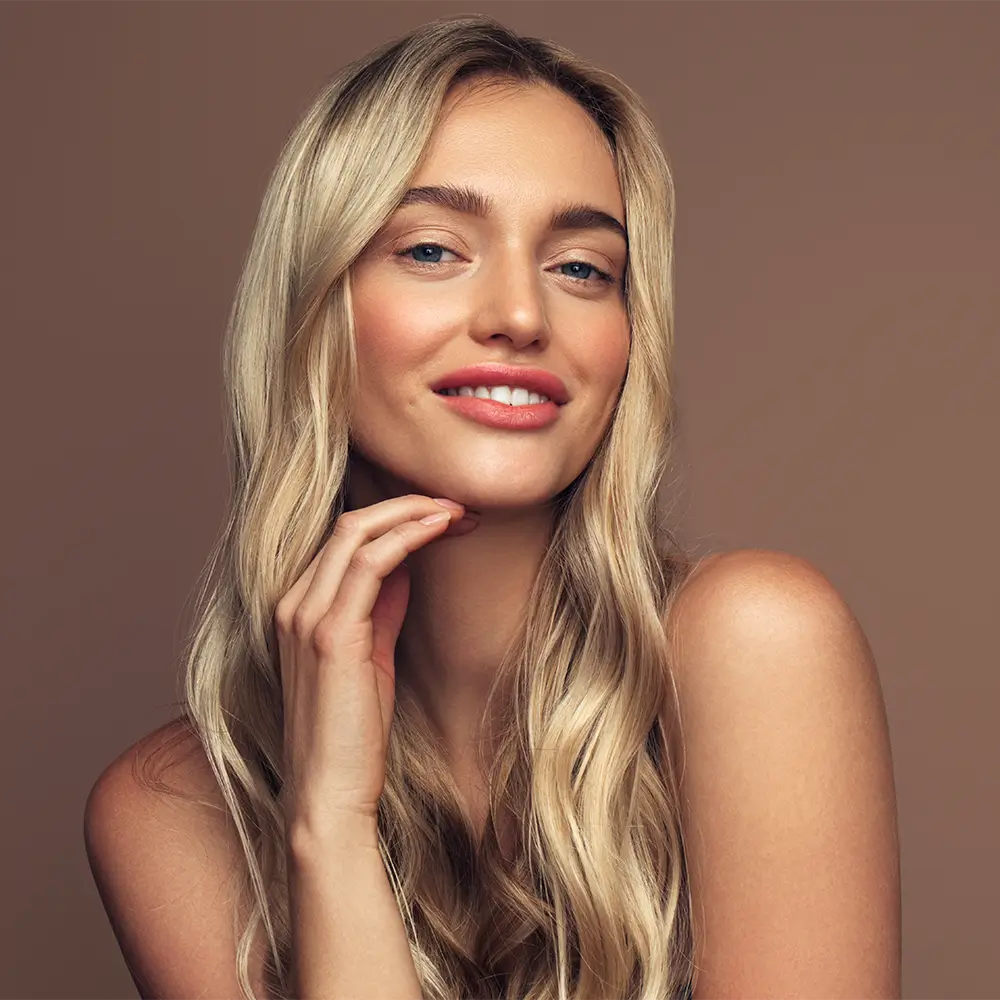 woman with smooth wrinkle-free face smiling